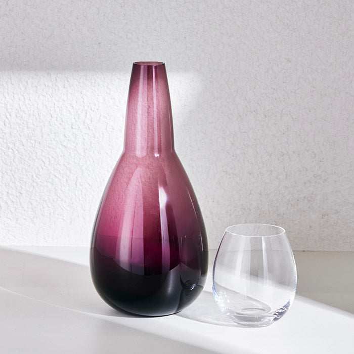 NUDE NIGHT WATER SET 1.5 Litre - VIOLETElevate your bedside or tabletop with the NUDE Night Water Set in a captivating Violet. Designed for both style and function, this sophisticated set includes a beautBottle