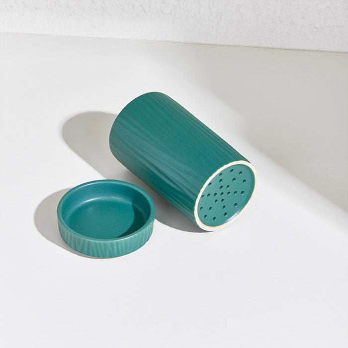 CERAMIC UTENSIL HOLDER - GREENOrganize your kitchen in style with this elegant green ceramic utensil holder! Designed with a modern ribbed texture and a practical draining base, this set of two iCeramic Utensil