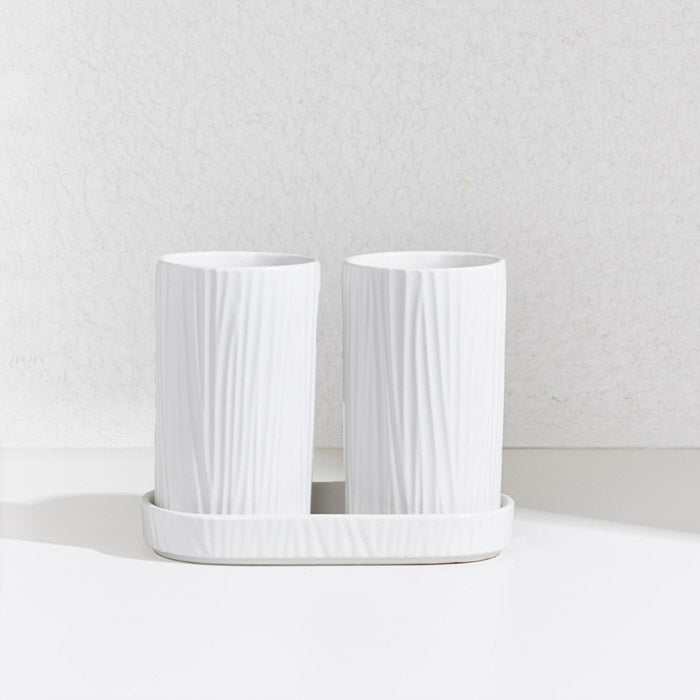 CERAMIC UTENSIL HOLDER - GREYOrganize your kitchen in style with this elegant grey ceramic utensil holder. Designed with a modern ribbed texture and a practical draining base, this set of two isCeramic Utensil