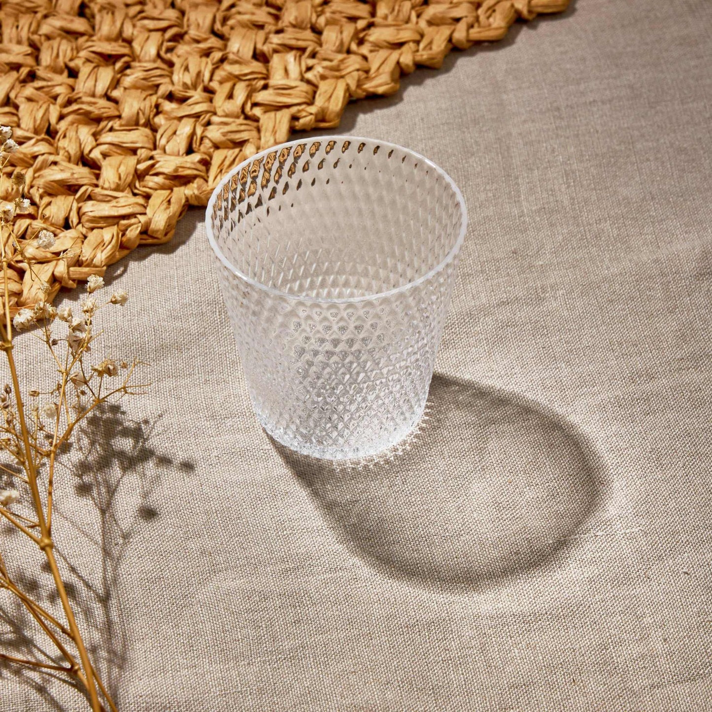 SMALL WATER GLASS 190ML - CLEAREnhance your table setting with our Small Water Glass (190ml)—a perfect blend of elegance and functionality. Crafted from high-quality glass with a beautifully textuGlass