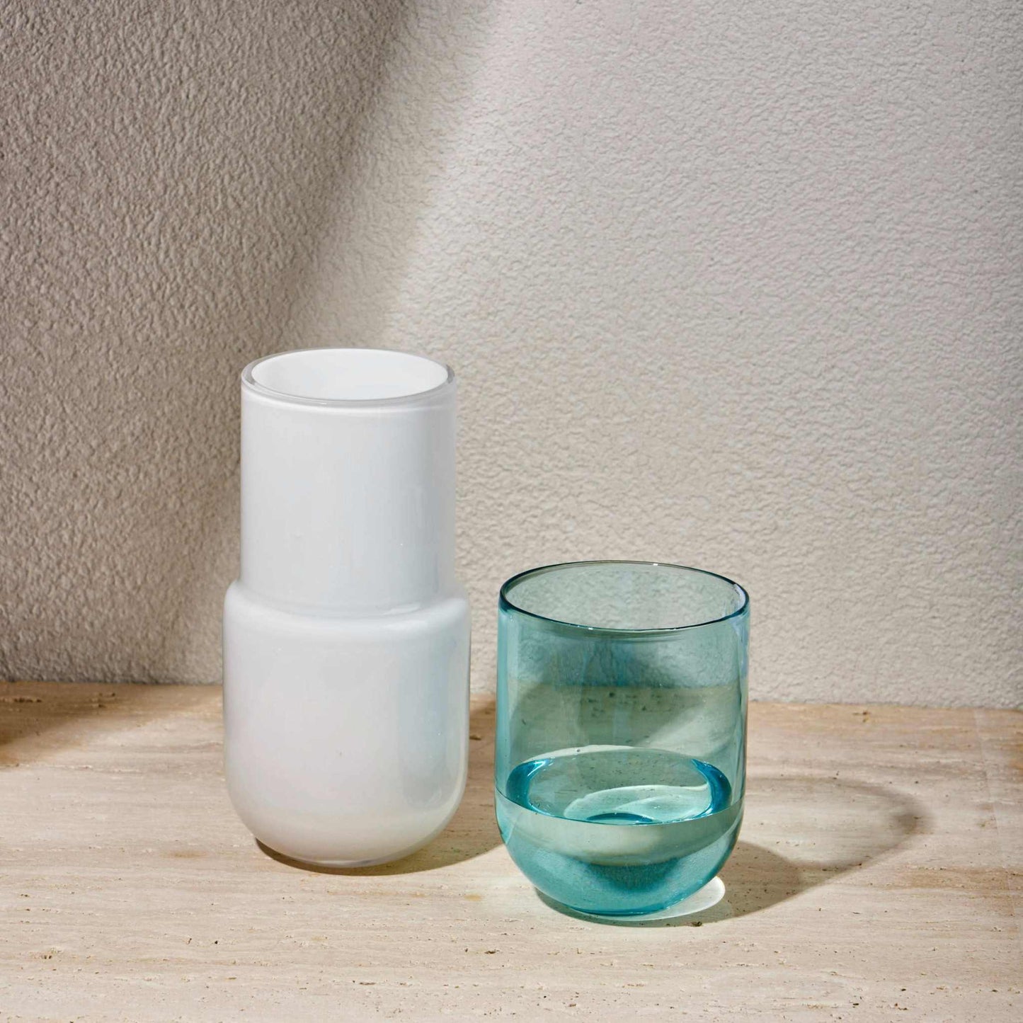 WATER NIGHT SET - SKY BLUEStay hydrated in style with this sleek and functional water night set, perfect for your bedside table. The set includes a minimalist carafe and a matching glass, desServing Pitchers