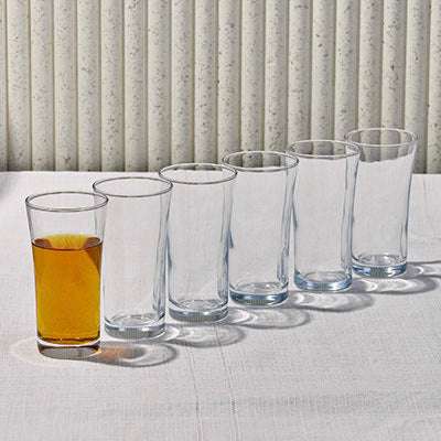 WITH GLASS SET - 6 PIECE (NO:05)Elevate your beverage experience with the elegant Glass Set. This collection features gracefully curved glasses, perfect for serving tea, cocktails, or other beveragGlass
