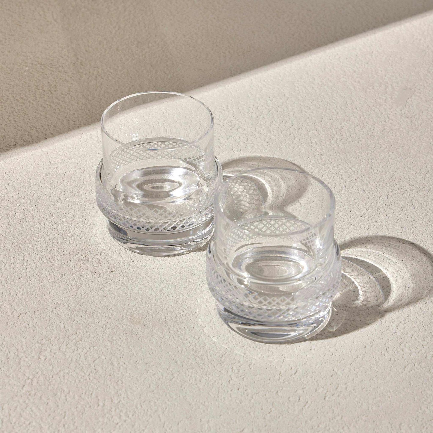 TWINKLE WHISKEY GLASS SET OF 2Enhance your whiskey-drinking experience with the Whiskey Glass, designed to bring a unique touch of sophistication to your collection. Featuring a cleverly crafted Glass