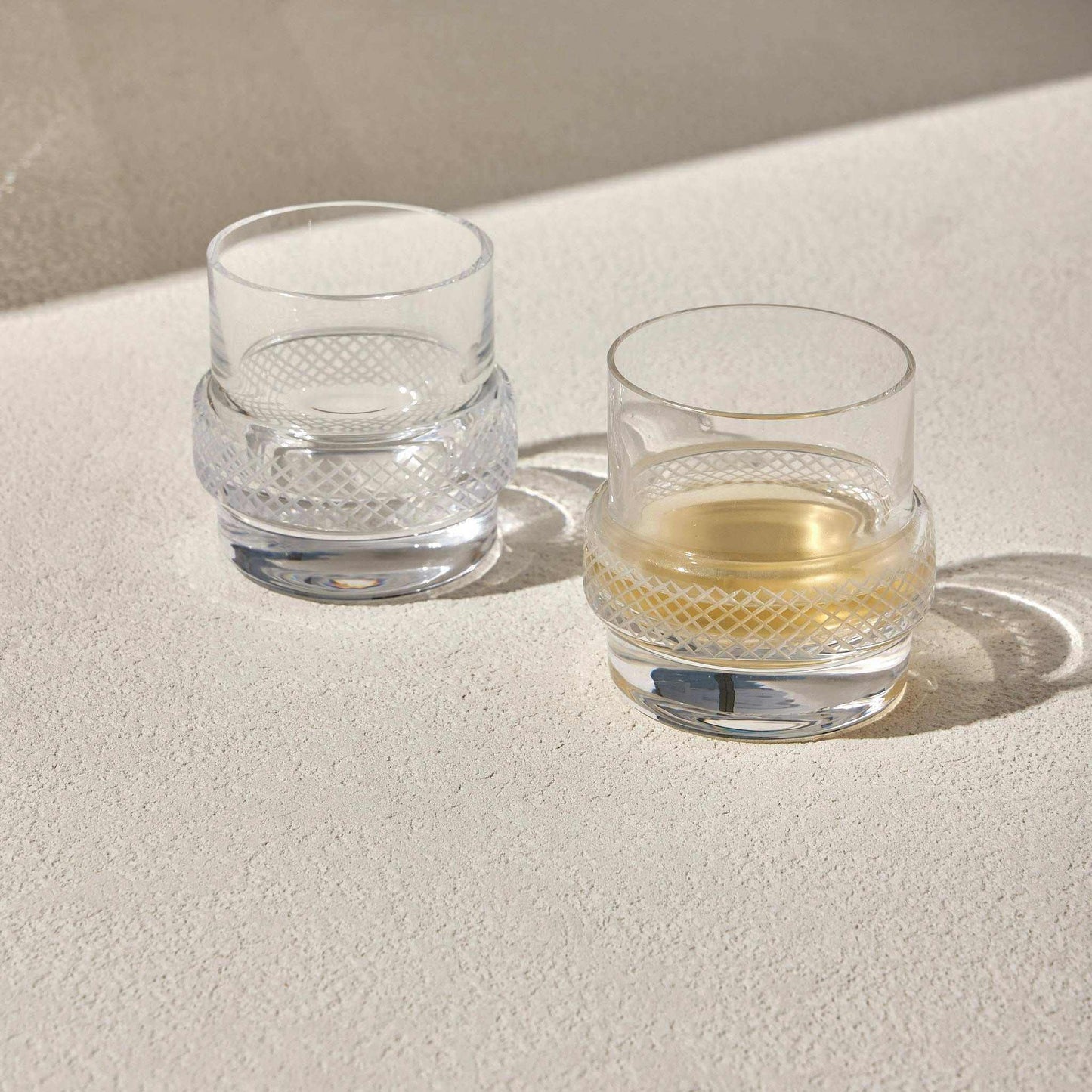 TWINKLE WHISKEY GLASS SET OF 2Enhance your whiskey-drinking experience with the Whiskey Glass, designed to bring a unique touch of sophistication to your collection. Featuring a cleverly crafted Glass