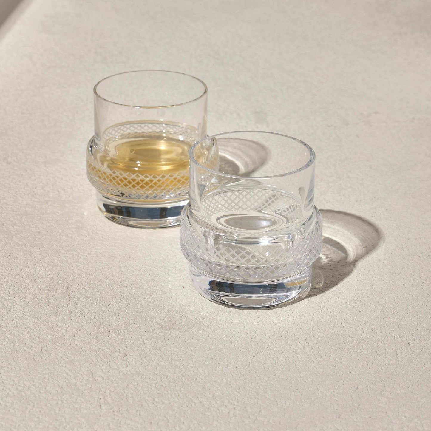 TWINKLE WHISKEY GLASS SET OF 2Enhance your whiskey-drinking experience with the Whiskey Glass, designed to bring a unique touch of sophistication to your collection. Featuring a cleverly crafted Glass