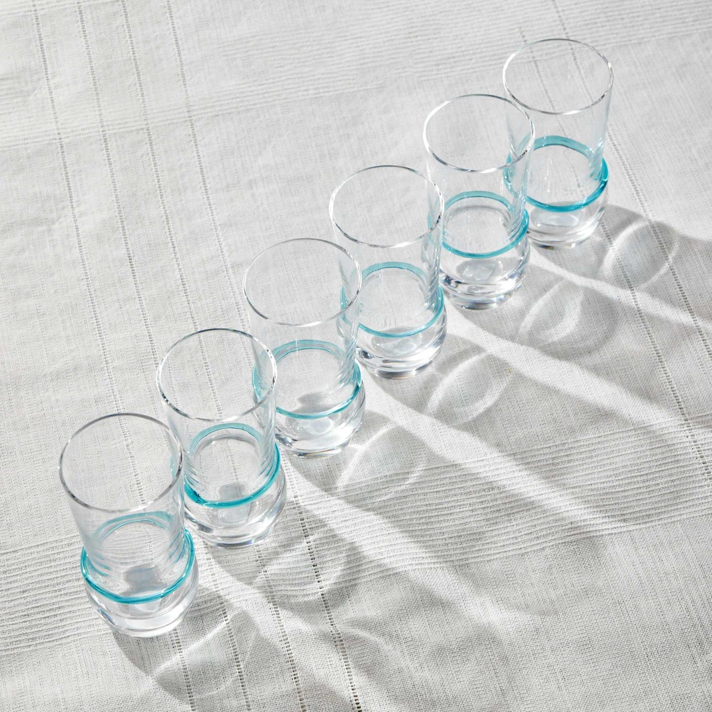 OMNIA TEA SET - 6 PIECEElevate your beverage experience with the elegant Glass Set. This collection features gracefully curved glasses, perfect for serving tea, cocktails, or other beveragGlass