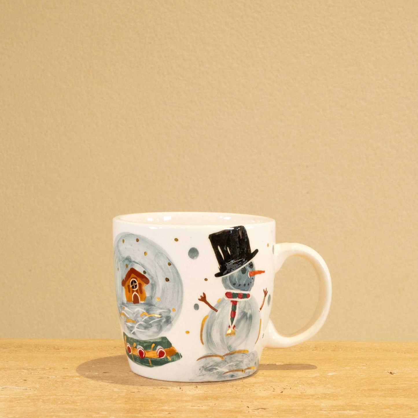 Handmade ceramic mug with gold-plated letter "Y" and floral design.