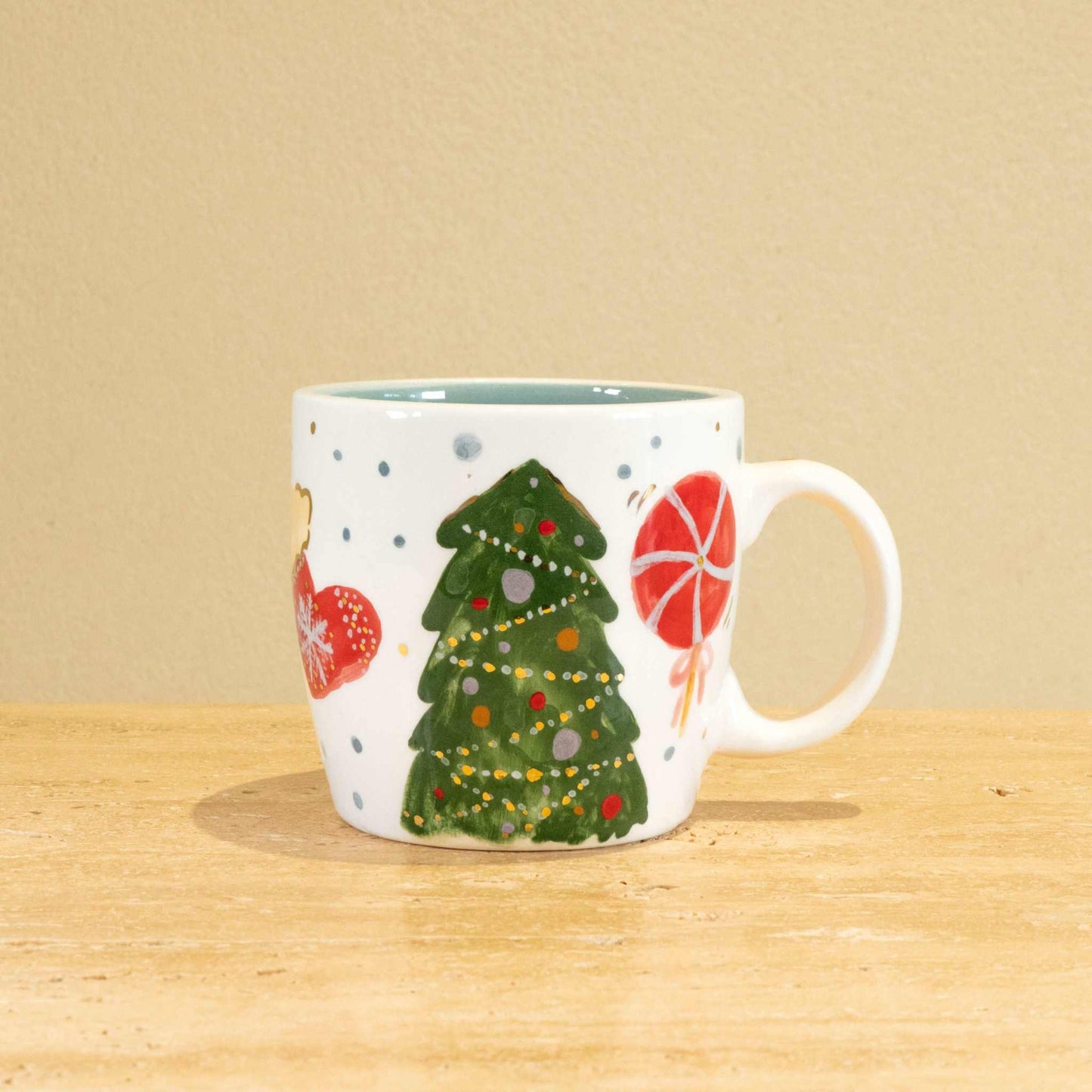 Custom handmade ceramic mug with gold-plated initial "S" and floral design.