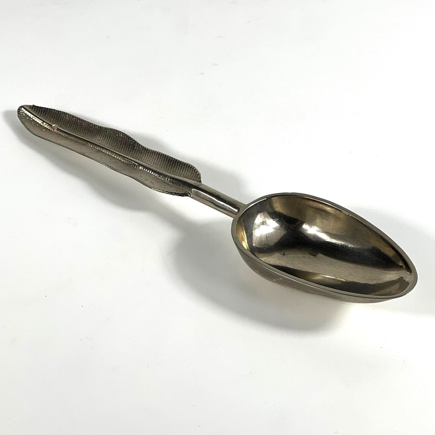 FEATHER BRASS SPOON