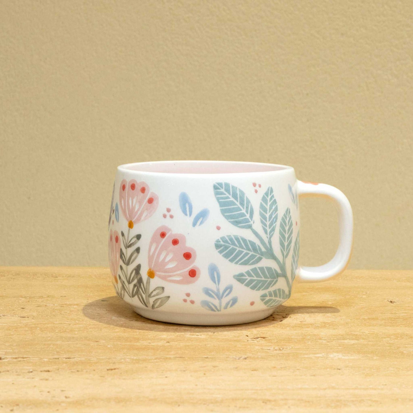 Personalized gold Arabic monogram ceramic mug with floral design for best female friend.