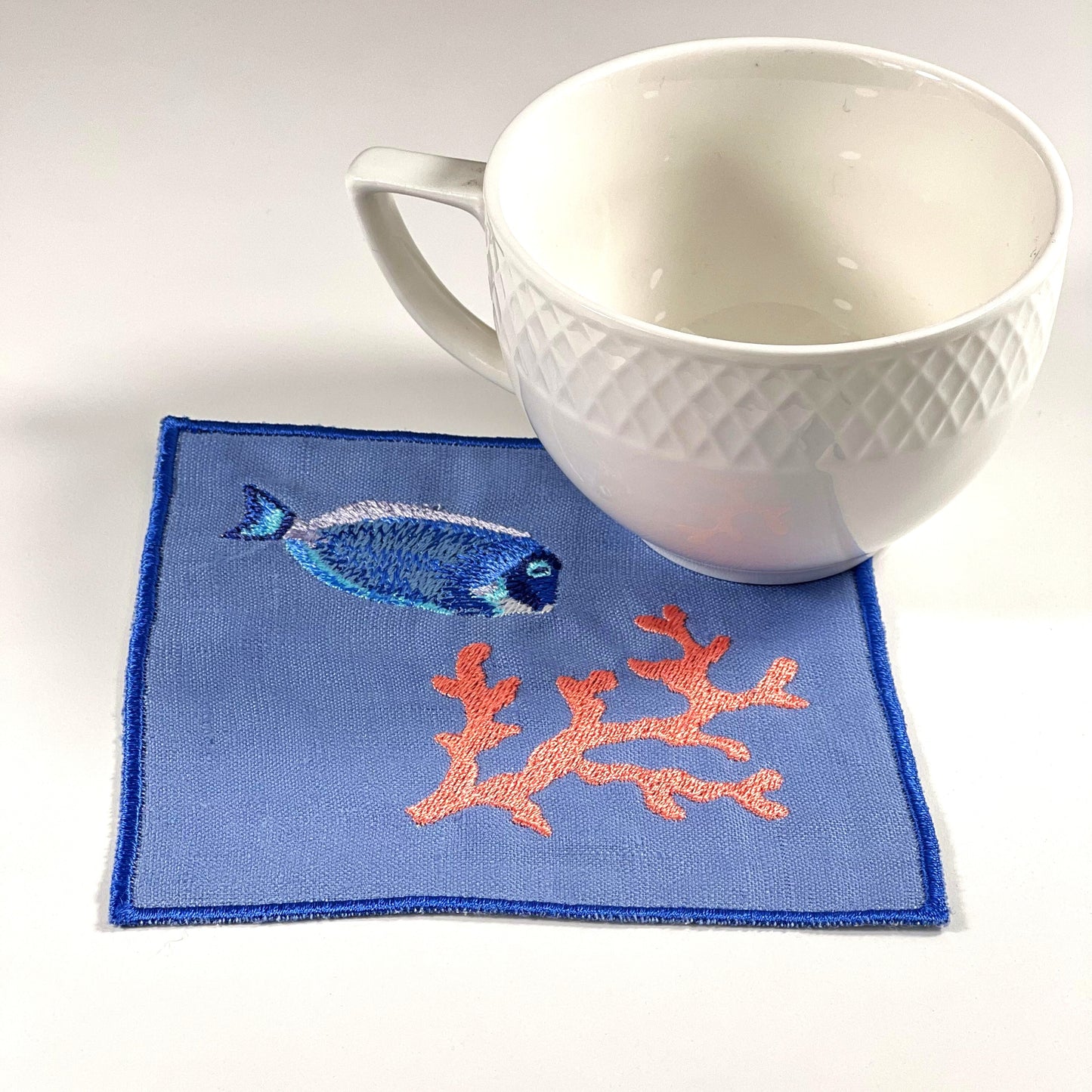 FISH WITH CORAL BLUE-ORANGE LINEN COASTER