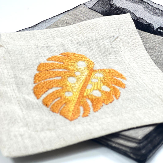 TROPICAL LEAVES-ORANGN NATUREL LINEN COASTER 12*12