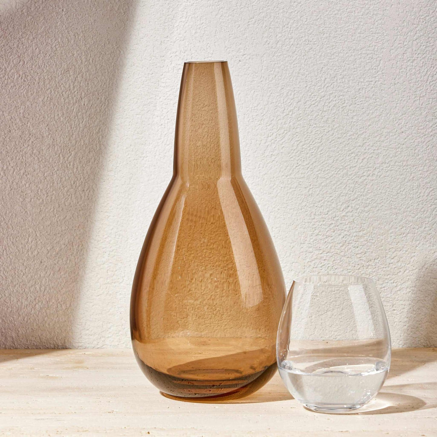 NUDE NIGHT WATER SET 1.5 Litre -BROWNElevate your bedside or tabletop with the NUDE Night Water Set in a rich and sophisticated brown hue. Designed for both style and function, this elegant set includesBottle