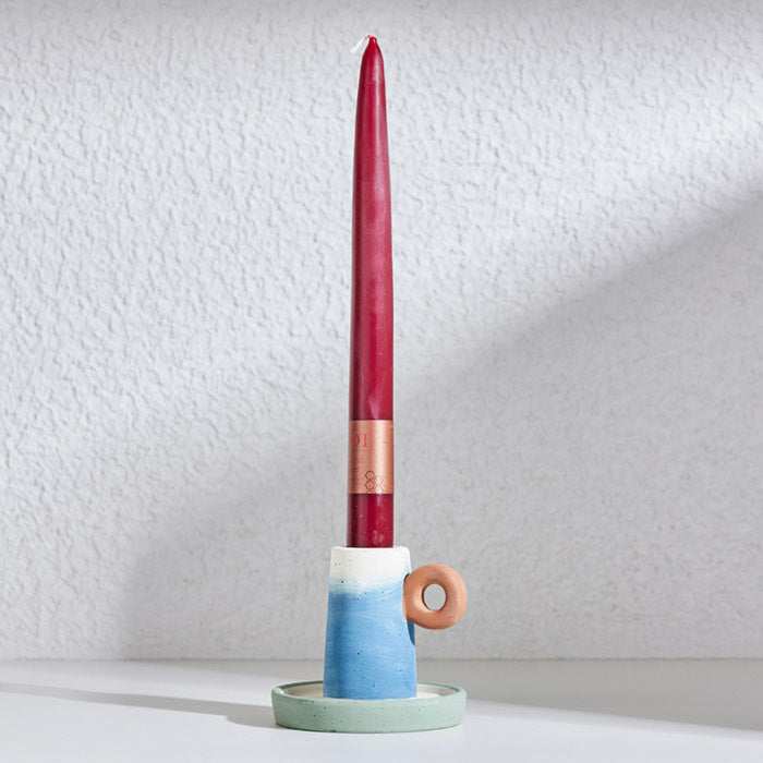 Panama Ceramic Big Straw Candle with multicolor ceramic base and woven straw accent.