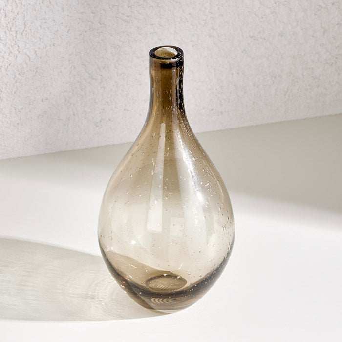 Brown apothecary glass vase with vintage charm and classic design.