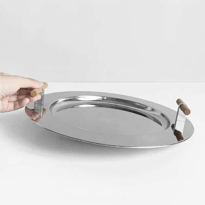 BELLA FRUIT BOWL - 30*30*18The BELLA fruit bowl combines modern elegance with functional design. Made from high-quality stainless steel, this sleek oval-shaped bowl features polished reflectivServing Tray