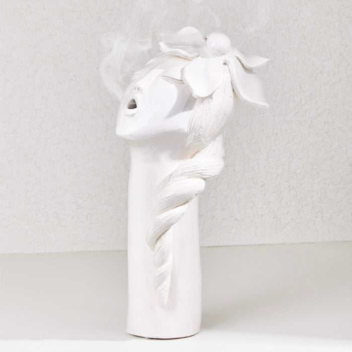 Ceramic handmade lily flower girl oud burner with artistic colorful girl-face design.