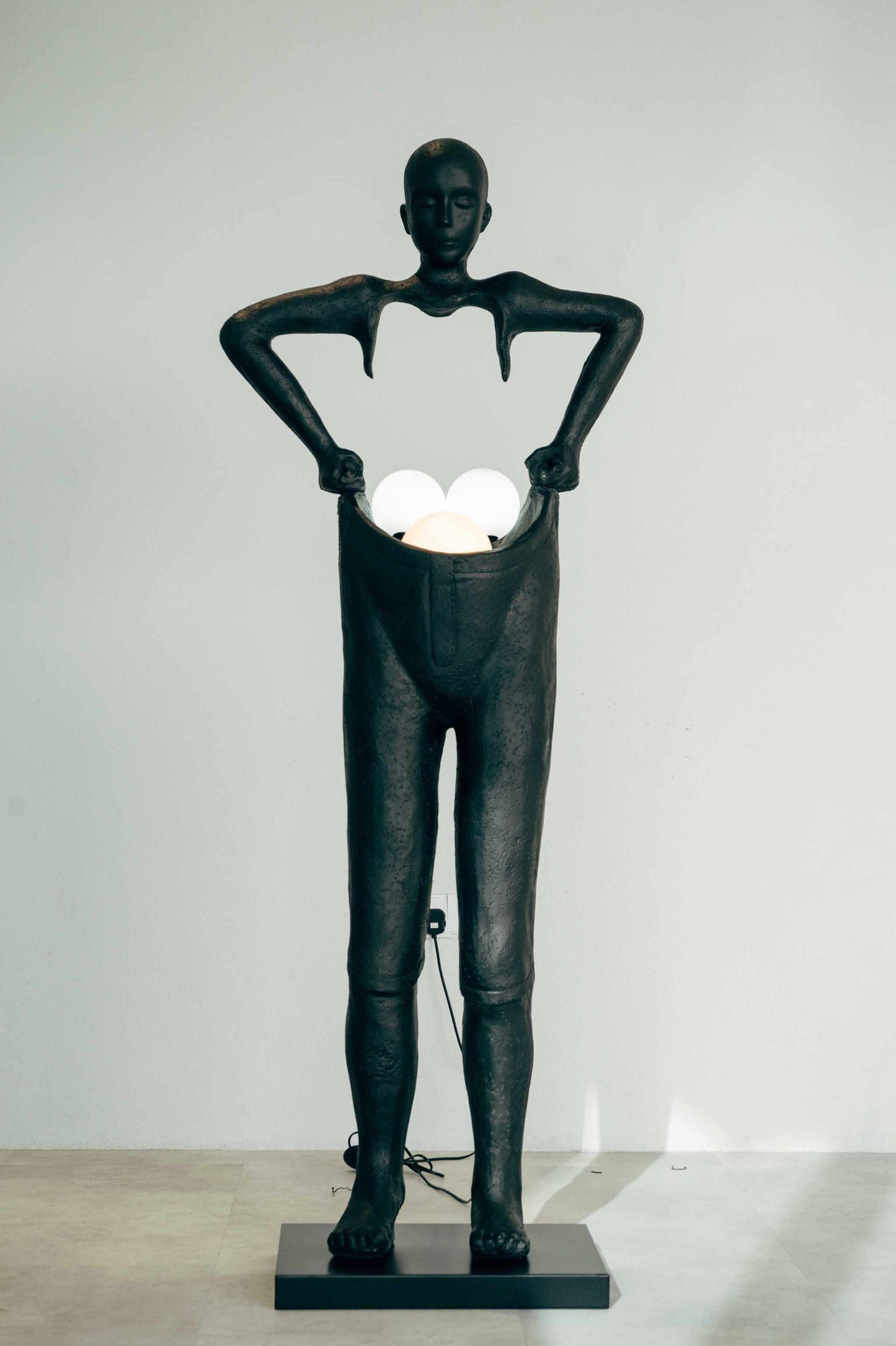 Pants Up Sculptural Floor Lamp - BlackElevate your home decor with this stunning sculptural floor lamp, a blend of art and functionality. Made from premium-quality fibre, this sleek, matte black abstractFloor Lamp