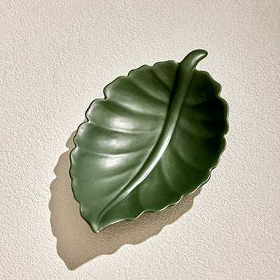 LEAF 1 CERAMIC decorative plate with leaf-inspired design.