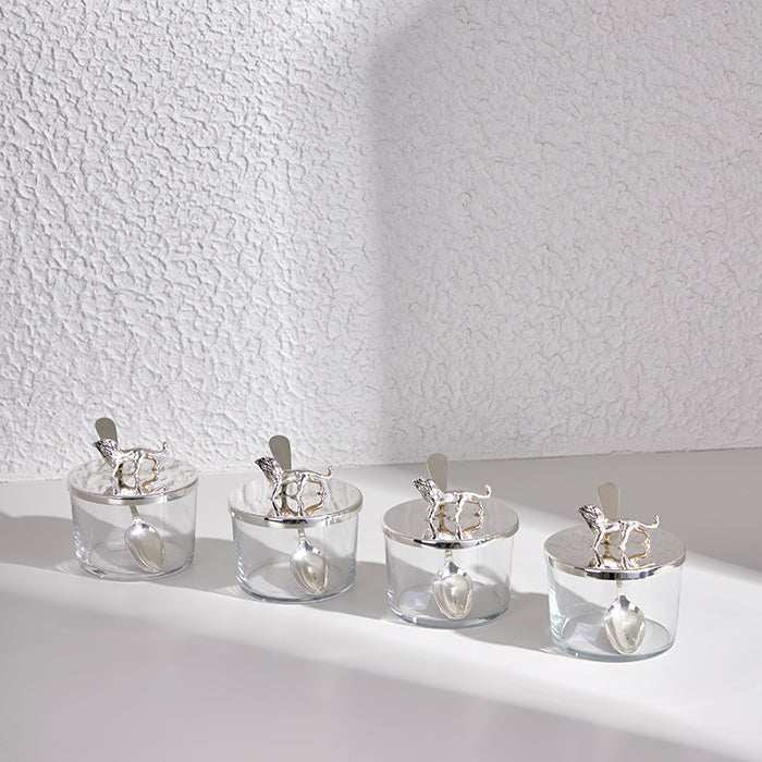 High-quality Leon Mini Canister with silver-plated lid and lion figurine.