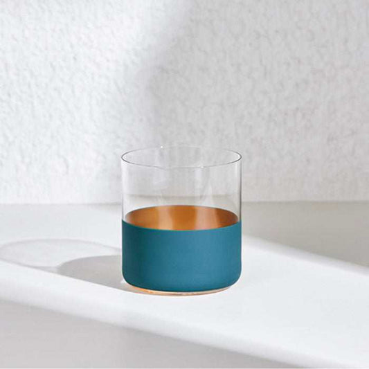 Whisky Glass in Green with deep red band and modern design.