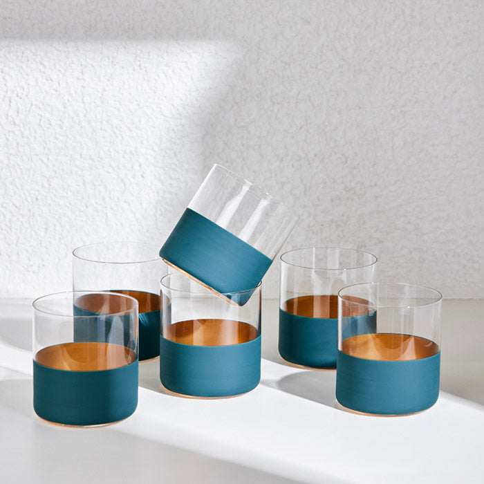WHISKY GLASS - GREENElevate your drinking experience with our Whisky Glass in Green, the perfect blend of elegance and functionality. Designed with a modern aesthetic, this glass featurGlass
