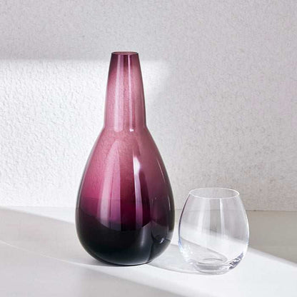 NUDE NIGHT WATER SET 1.5 Litre - VIOLETElevate your bedside or tabletop with the NUDE Night Water Set in a captivating Violet. Designed for both style and function, this sophisticated set includes a beautBottle