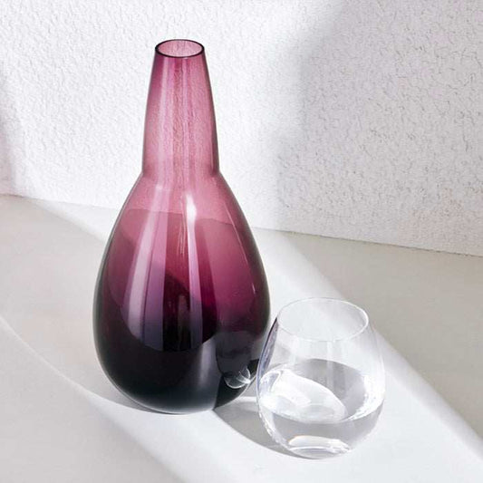 NUDE NIGHT WATER SET 1.5 Litre - VIOLETElevate your bedside or tabletop with the NUDE Night Water Set in a captivating Violet. Designed for both style and function, this sophisticated set includes a beautBottle