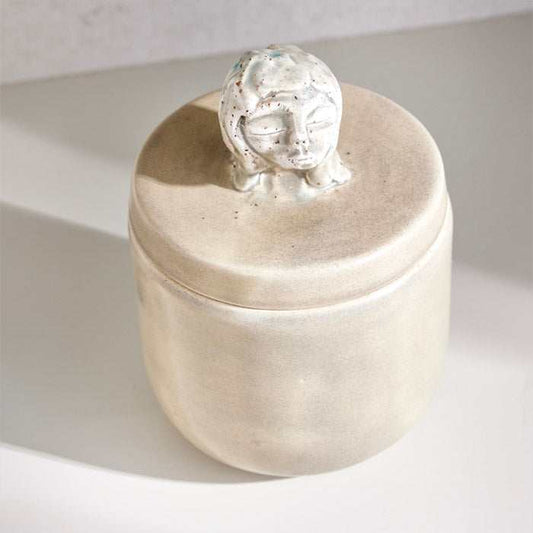 Handmade Sleeping Girl Ceramic Jar in Stoon Gold finish, featuring a sculpted face lid for storing jewelry or trinkets.