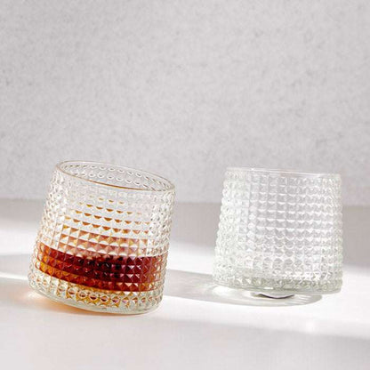 REVOLVING WHISKEY GLASSEnhance your whiskey-drinking experience with the Revolving Whiskey Glass, designed to bring a unique touch of sophistication to your collection. Featuring a cleverlGlass Mug