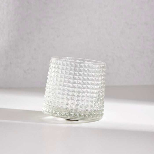 Revolving Whiskey Glass with Textured Design on Tilted Base