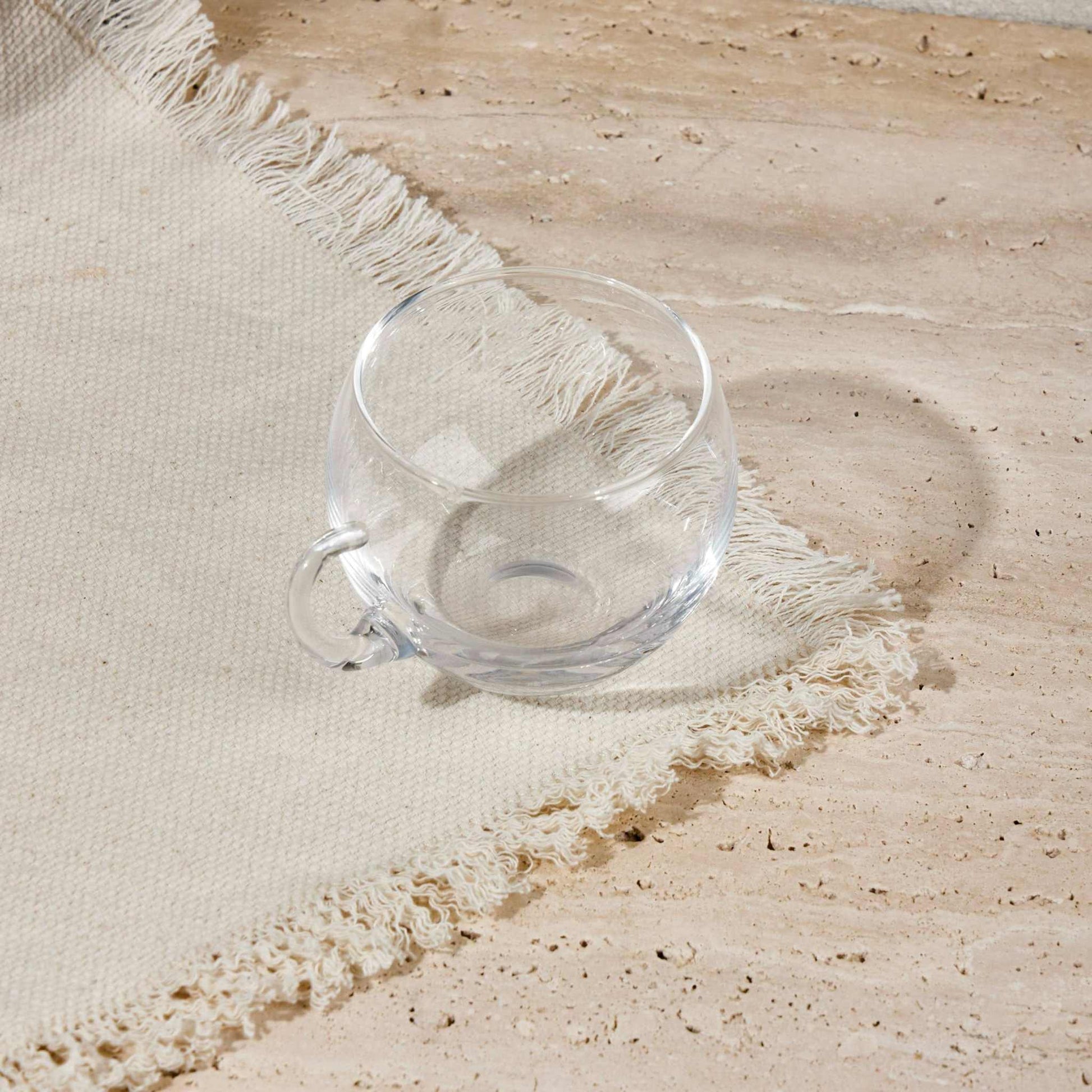 GLASSY CUPExperience the charm of the Glassy Cup, a perfect blend of elegance and practicality. Crafted from premium-quality transparent glass, this cup highlights the naturalGlass