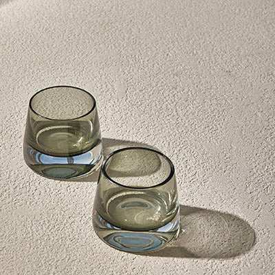 JOY GLASS T-SET OF 2 - LIGHT GRAYExperience the charm of the JOY GLASS, a perfect blend of elegance and practicality. Crafted from premium-quality transparent glass, this cup highlights the natural Glass
