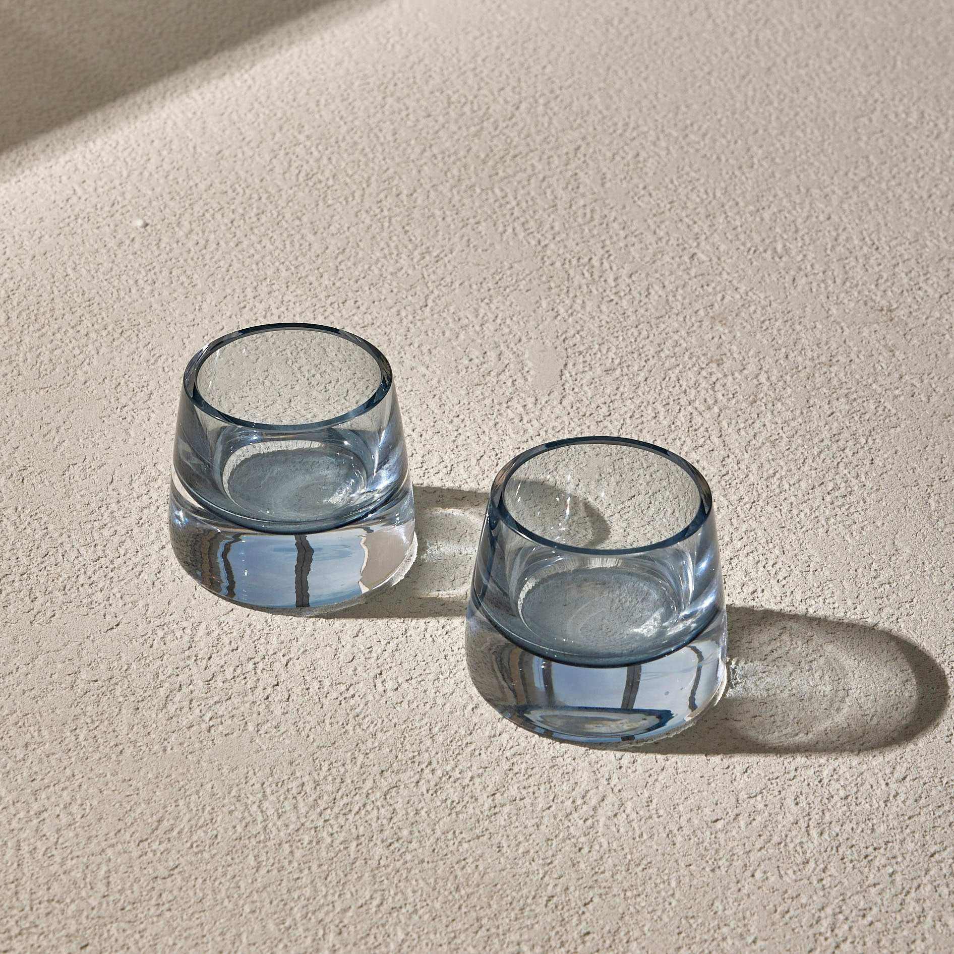 JOY GLASS T-SET OF 2 -  LIGHT STEEL BLUEExperience the charm of the JOY GLASS, a perfect blend of elegance and practicality. Crafted from premium-quality  LIGHT STEEL BLUE, this cup highlights the natural Glass