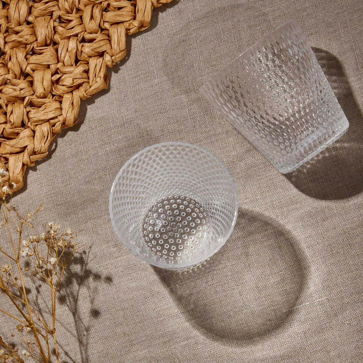 SMALL WATER GLASS 190ML - CLEAREnhance your table setting with our Small Water Glass (190ml)—a perfect blend of elegance and functionality. Crafted from high-quality glass with a beautifully textuGlass