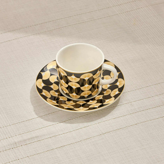 SENSU PORCELAIN ESPRESSO CUP with hand-painted oceanic design on a saucer.