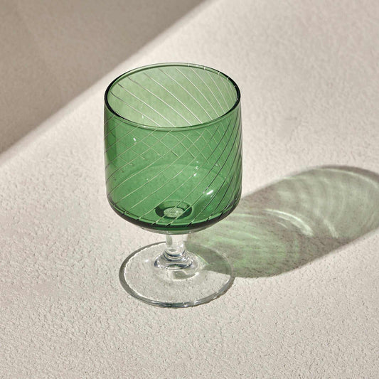 LAL WINE GLASS-GREEN glass with diagonal stripe design and clear stem.