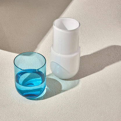 Turquoise water night set with carafe and matching glass.