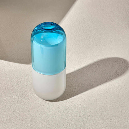 WATER NIGHT SET - TURQUOISEStay hydrated in style with this sleek and functional water night set, perfect for your bedside table. The set includes a minimalist carafe and a matching glass, desServing Pitchers