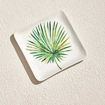 Rainforest porcelain plate with a glossy finish featuring a detailed green leaf design.