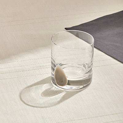 DOT WHISKEY GLASS - OPAL MINK, premium ergonomic whiskey glass with unique spinning base, ideal for whiskey, bourbon, scotch, or cocktails.