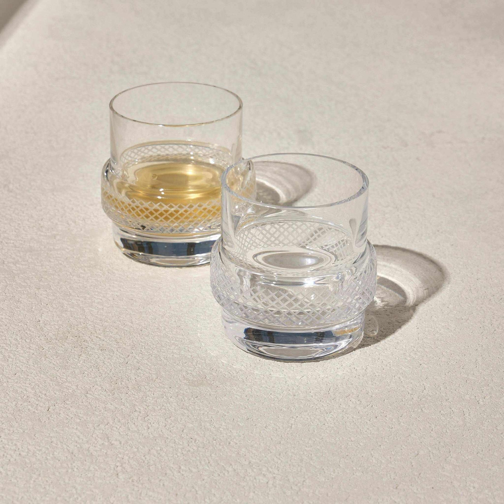 TWINKLE WHISKEY GLASS SET OF 2Enhance your whiskey-drinking experience with the Whiskey Glass, designed to bring a unique touch of sophistication to your collection. Featuring a cleverly crafted Glass