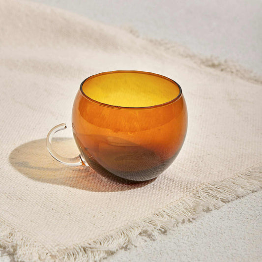 OPTIC CUPEnhance your drinkware collection with the Optic Cup, featuring a sleek, rippled texture that adds sophistication and style to any setting. Crafted from high-qualityGlass Mug