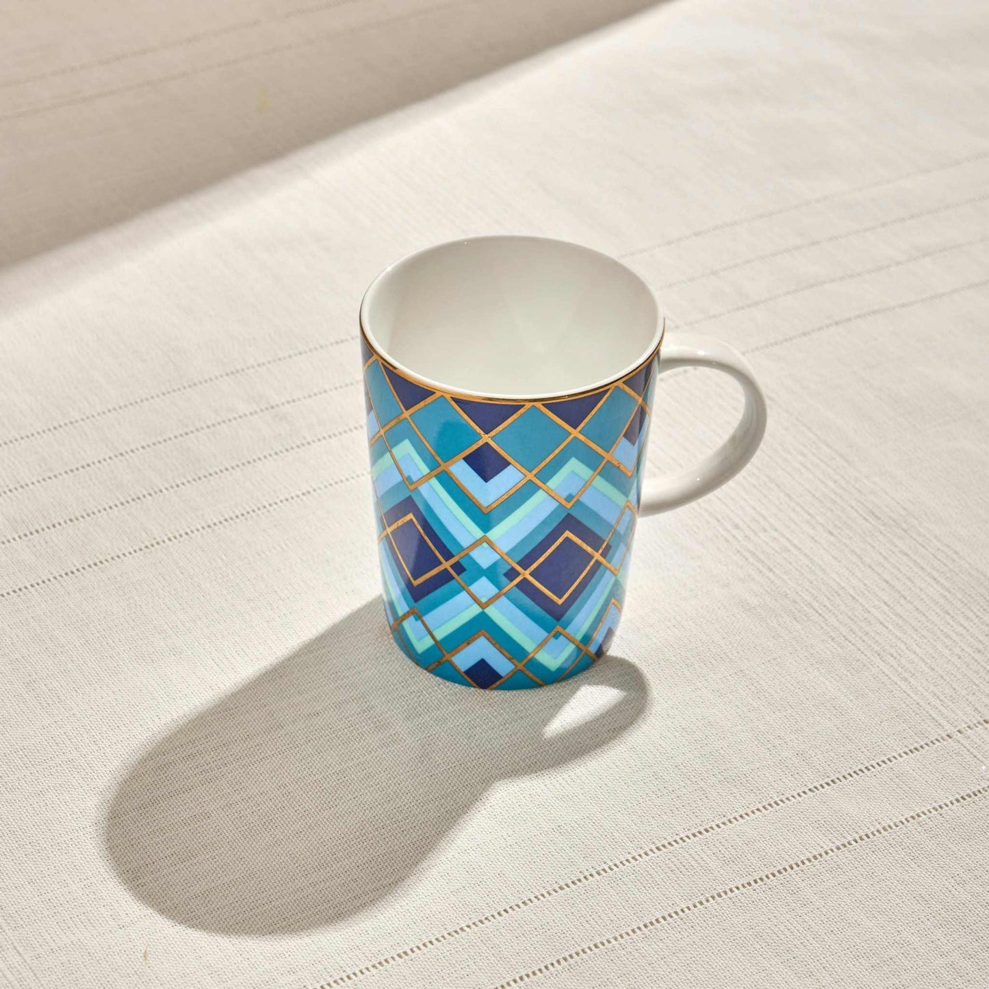 Atlantic Porcelain Mug with geometric pattern on a light background.