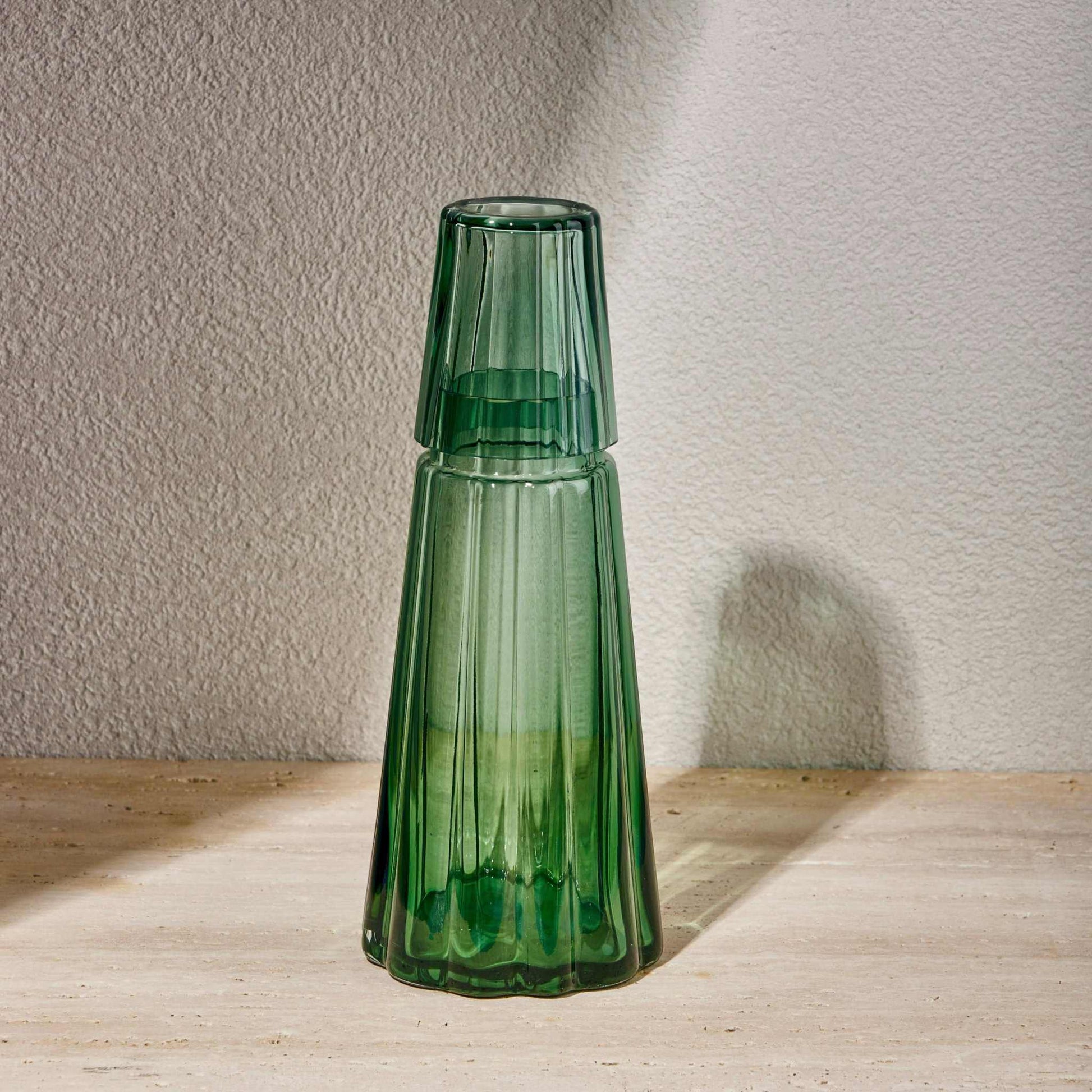 NIGHT WATER SET 850ML - GREENElevate your bedside or tabletop with the Green Night Water Set in a captivating turquoise hue. Designed for both style and function, this sophisticated set includesBottle