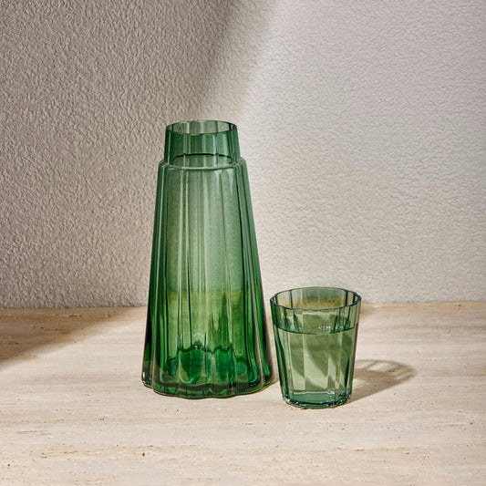 NIGHT WATER SET 850ML - GREENElevate your bedside or tabletop with the Green Night Water Set in a captivating turquoise hue. Designed for both style and function, this sophisticated set includesBottle