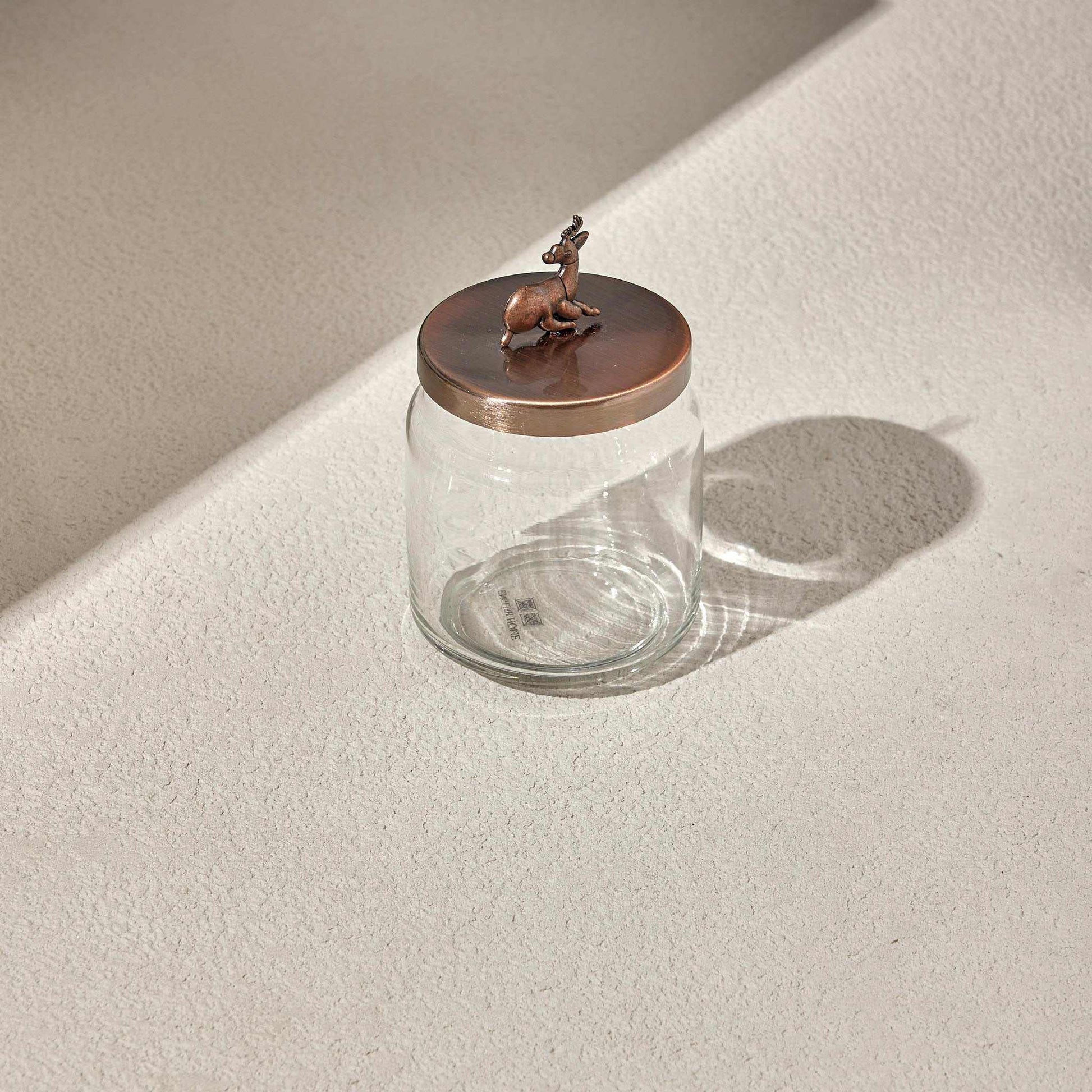 Shiny Deer Glass Jar with Bronze Lid featuring a decorative deer, ideal for storing candies or spices.
