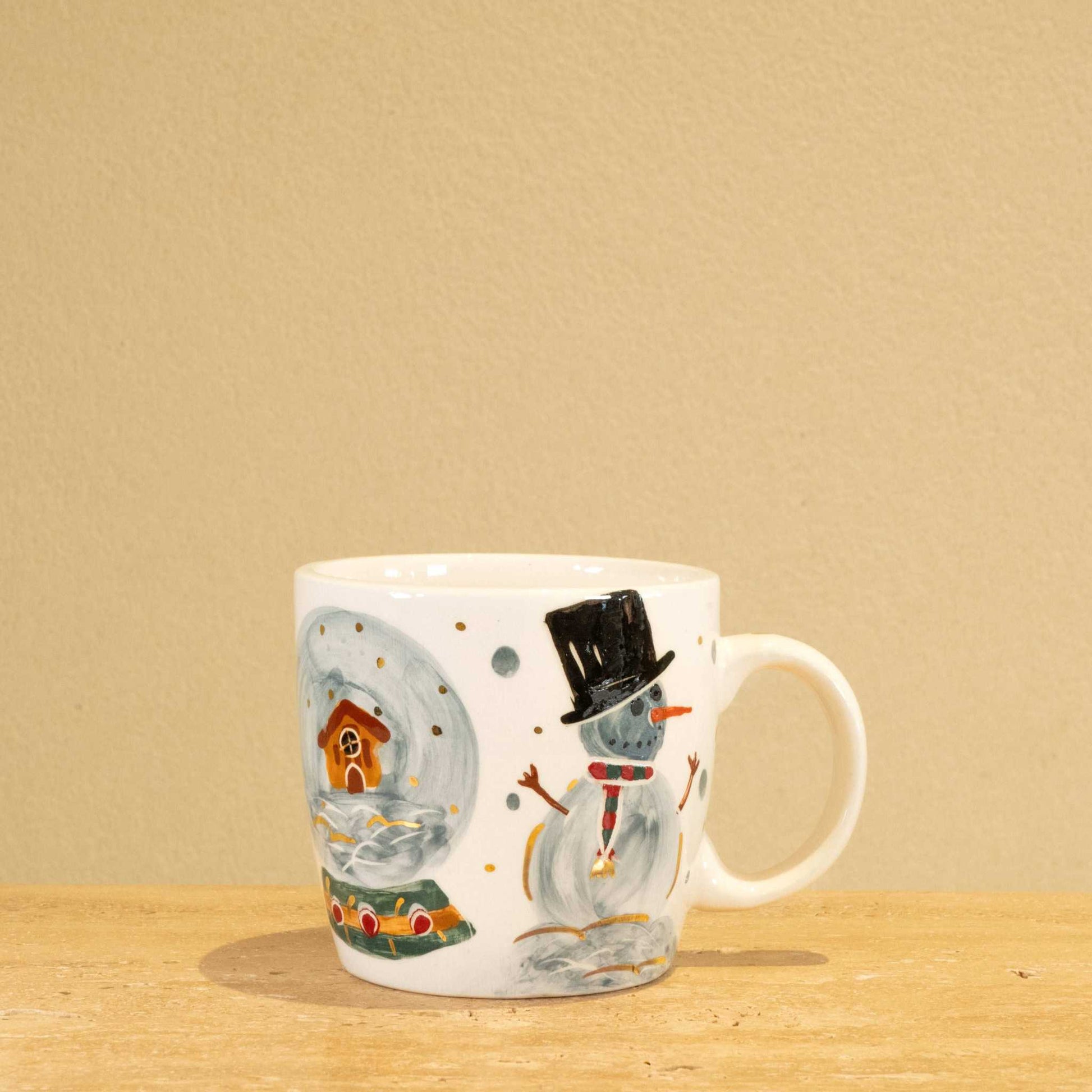 Handmade ceramic mug with gold-plated letter "Y" and floral design.