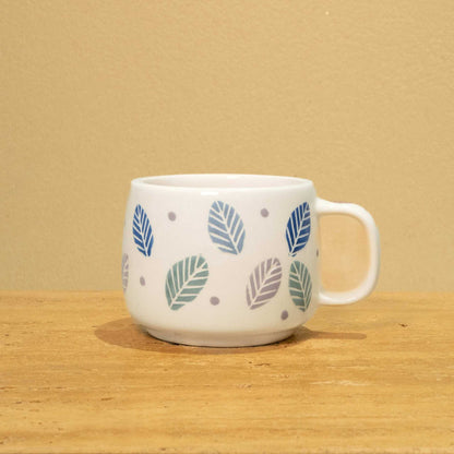Exquisite handmade ceramic mug with gold Arabic monogram "Best Dad in the World" and vibrant floral design.