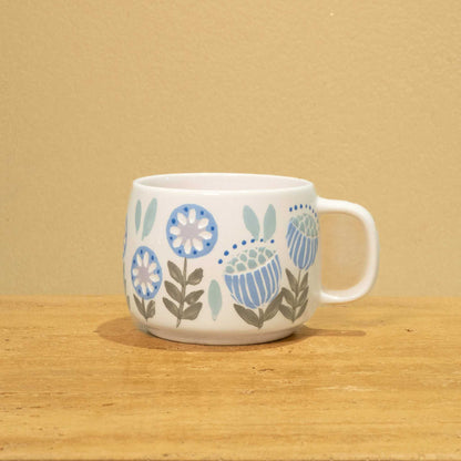 Exquisite ceramic mug with gold Arabic monogram "Best Brother in the World" and floral design.